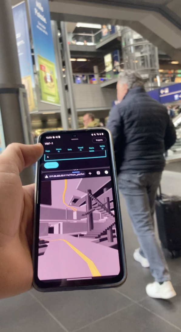 A phone being used for a navigation test inside the station